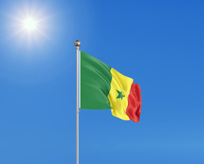 3D illustration. Colored waving flag of Senegal on sunny blue sky background.