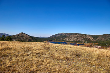 landscape steppe and wooded mountains.