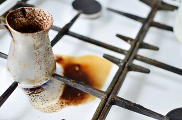 Spilled coffee on a gas stove