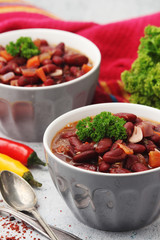 Two bowls with traditional Georgian dish - lobio	