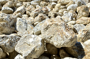 Natural gray gypsum stone. Close up image of stones with black and white. Industrial mining area. Limestone mining, quarry - Image