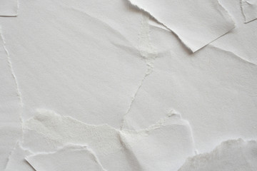 Fototapeta na wymiar Blank white torn damaged paper poster texture background