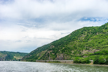 Germany, Rhine Romantic Cruise, a body of water with a mountain in the background