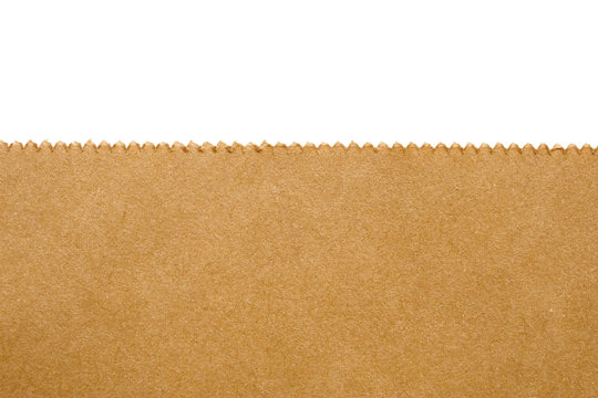 Close up brown paper bag texture isolated on white background