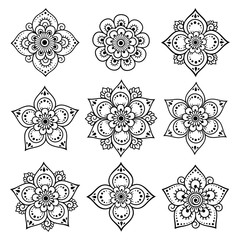 Set of Mehndi flower pattern for Henna drawing and tattoo. Decoration in ethnic oriental, Indian style. Doodle ornament. Outline hand draw vector illustration.