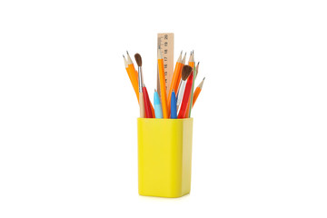 Stationery in holder isolated on white background