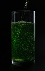 glass of water with ice and mint isolated on white