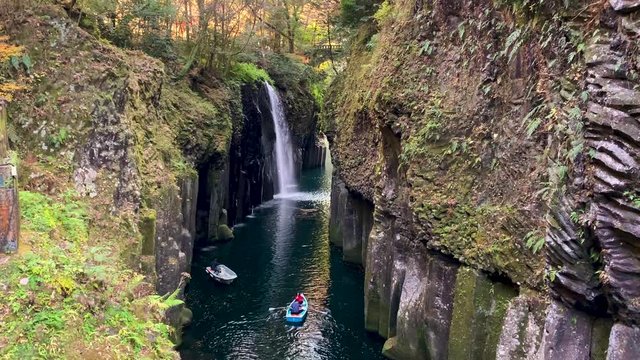 Waterfall and boat at Takachiho Gorge in Takachiho, Miyazaki, Kyushu, Japan