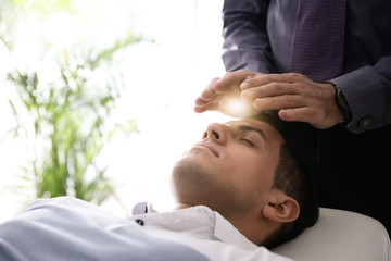 Psychotherapist and patient in office. Hypnotherapy session