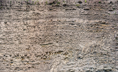 Photo of an old stone texture in mountains, stone background