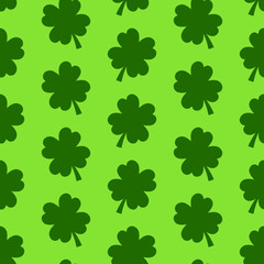 Fototapeta premium Four-leaf clover seamless pattern. St. Patrick's Day symbol background.