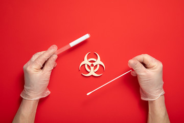 Epidemic virus respiratory syndrome with biohazard symbol on red background. Chinese coronavirus...
