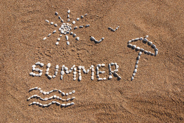 Summer picture from pebble and sand on a beach