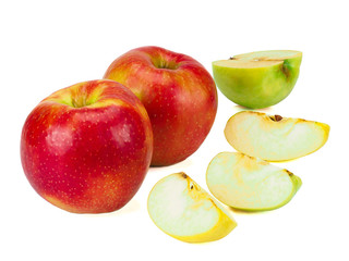 solated apples. Whole red apples fruit with green, yellow slices cut isolated on a white