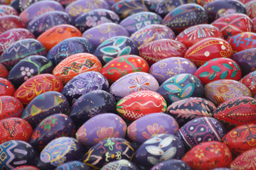 Fototapeta na wymiar Full background of colorful, hand painted Easter eggs
