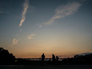 Fototapeta na wymiar Silhouette of couple at sunset.