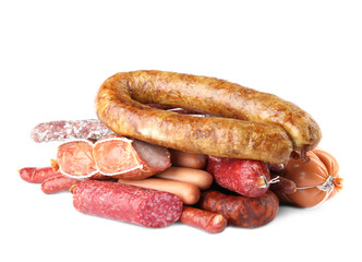 Different tasty sausages on white background. Meat product