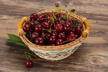 Sweet ripe cherry with leaves