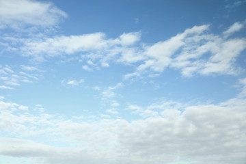 Naklejka na ściany i meble Beautiful blue sky with clouds on sunny day