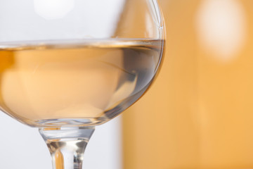glasses and bottles with orange wine