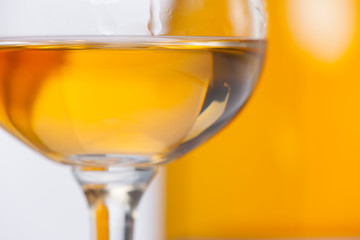 glasses and bottles with orange wine