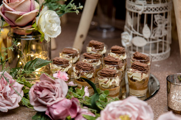 Delicious Dessert table for a Wedding or Party. Cupcakes, sweets, mock-tails and juices