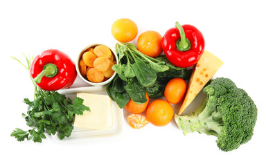 Fresh products rich in vitamin A on white background, top view