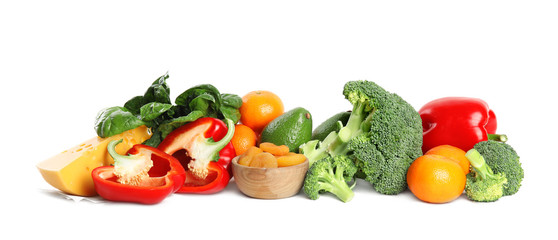 Fresh products rich in vitamin A on white background