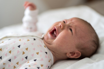 Close up of crying newborn baby girl