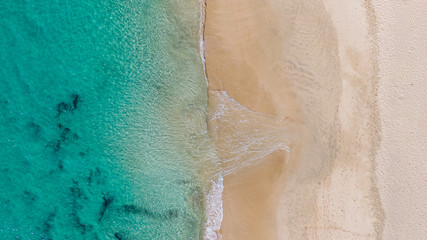 Morro Jable Canary Island, Fuerteventura Spain, Aerial view on coast of atlantic ocean and beach, Drone shot of sea 