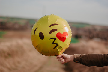 girl with balloon emoji