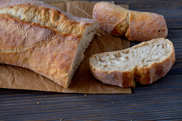 Sliced homemade  breads on wooden table