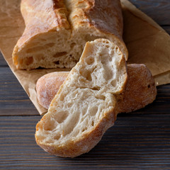 Sliced homemade  breads on wooden table
