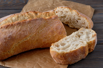 Sliced homemade  breads on wooden table