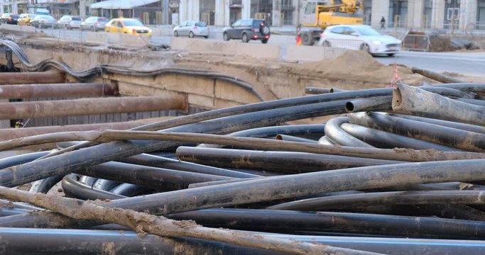 Pipes at construction site in Bucharest, Romania, on Decebal Boulevard, place for a new underground parking.