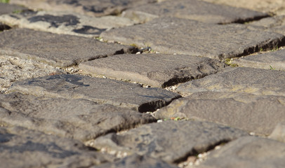 Close up picture of an old cobblestone / paving street,  background