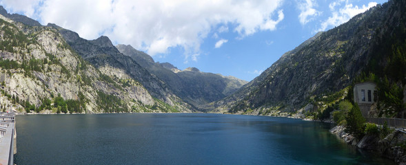 Naklejka na ściany i meble Panoramic view of the Cavallers Reservoir and the groundhog route. Aigüestortes National Park and Lake Sant Maurici, the Pyrenees Mountains, Catalonia