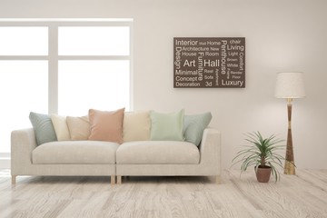 Modern living room in white color with sofa. Scandinavian interior design. 3D illustration
