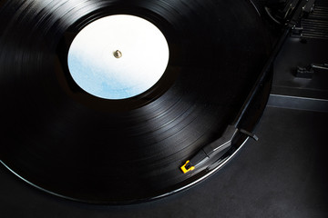 vinyl record playing on old record player