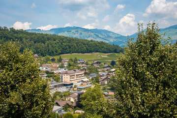 Obraz premium Aerial view of small swiss town in alps