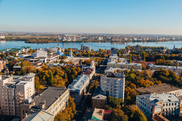 Sunny golden autumn Voronezh. Aerial view from skyscraper roof heigh