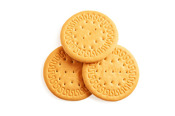 Round cookies on a white background. Wheat biscuits on the table. Morning breakfast cracker snack. Wheat light meal snack in lunch time.