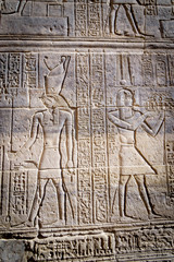 Hieroglyphic scripture on a temple wall   