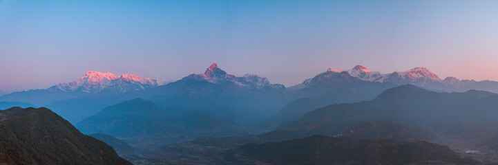 Sunrise panoramic view from Sarangkot Hill with Himalayan Mountains in background such as...