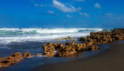 waves crashing on a rocky beach