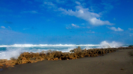waves crashing on a rocky beach