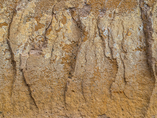 Detail of a rock with vertical drawings