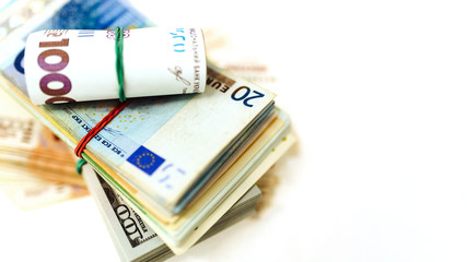 Pack of money from different countries on the table. Dollars, euros, hryvnias, Russian rubles, exchange rate. Business and finance. Currency confrontation on world market.