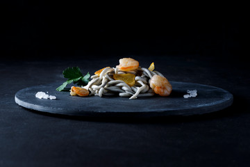 Angula with prawn and parsley