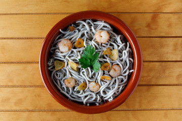 Angula with prawn and parsley